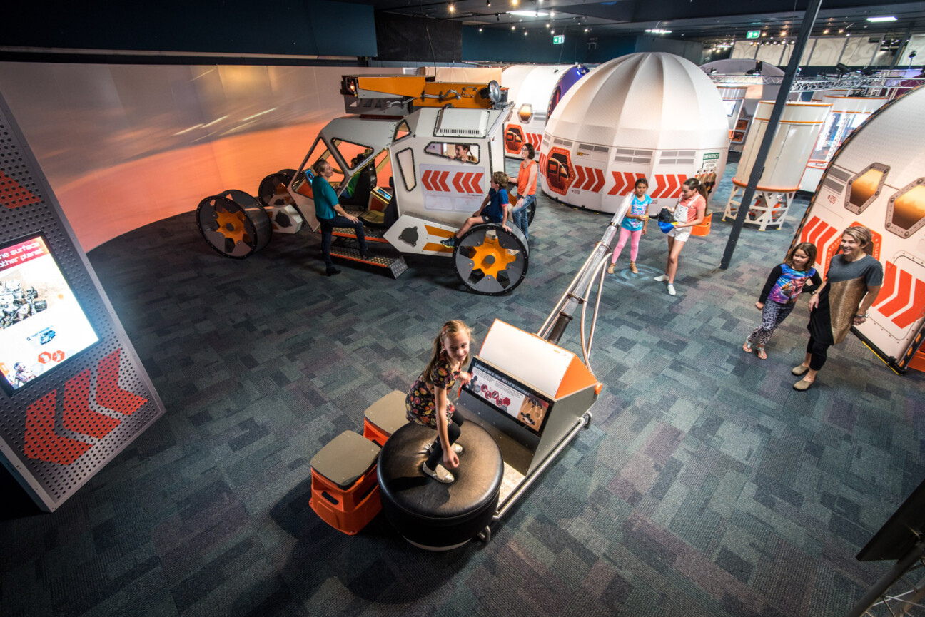 View looking down over three exhibits in the Destination Mars exhibiton